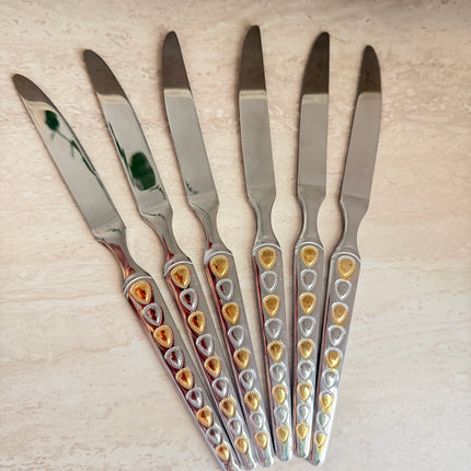 6 قطع من السكاكين الفضية والذهبية