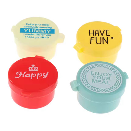 4 زجاجات صلصة صغيرة