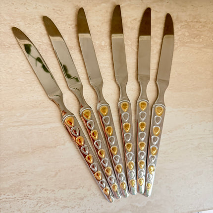 6 قطع من السكاكين الفضية والذهبية