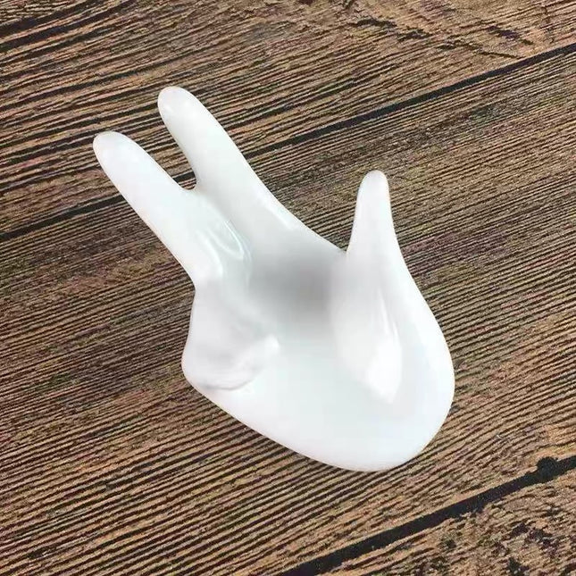 قطعة واحدة من السيراميك الصلب على شكل يد للعرض